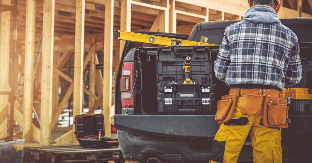 From DIYers to Professional Contractors What Size Pickup is Right for You - contractor working at pickup bed