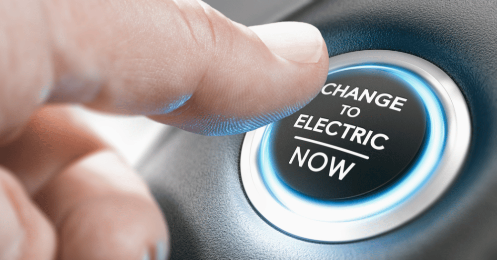 Should You Buy a New or Pre-Owned EV Before Tax Credits Disappear - featured image of an ev start button